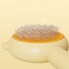 ec695d29-034a-4f4d-b7b6-73e00b08ab23-1.jpg Brosse de Toilettage